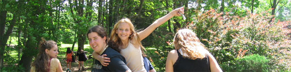 girls entering the cabin area at arts summer camp