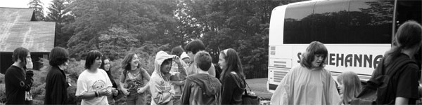 bus arrives at fine and performing arts summer camp