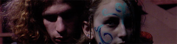 daramatic picture of kids at theater camp performig in fantasy makeup